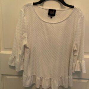 Cream colored dotted top